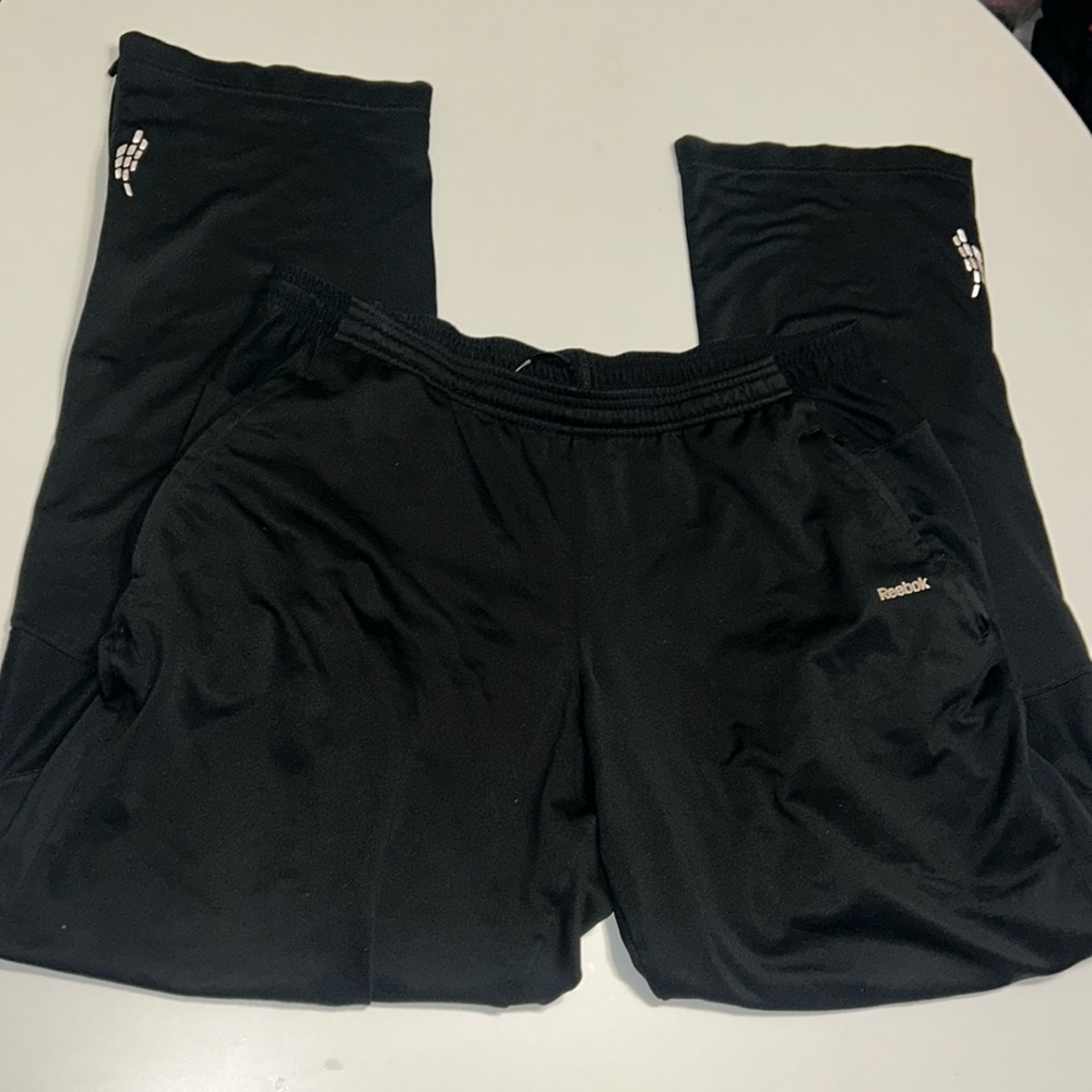 Men's Reebok black track pants size large with zipper pockets